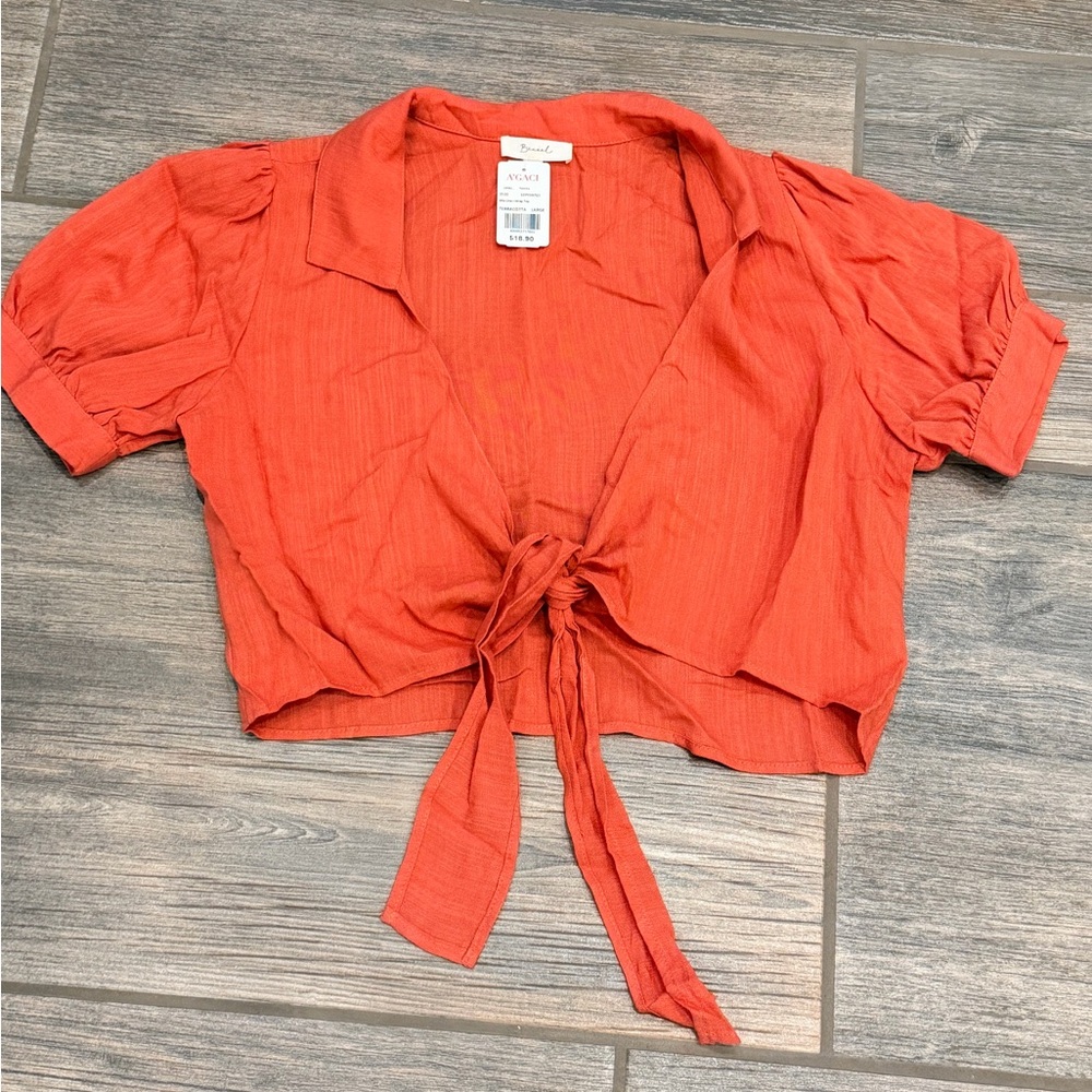 A’gaci Mia line wrap short sleeve tie-front top